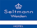 Logo der Firma Seltmann in weißer Schrift mit Krone auf blauem Hintergrund